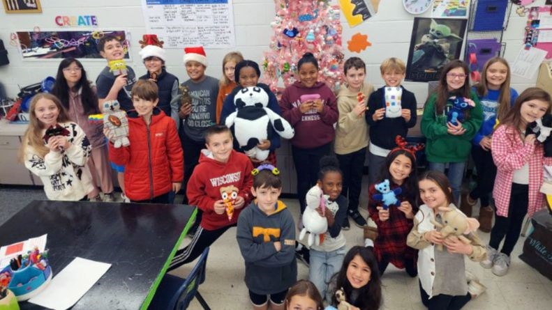 Vaughan students show off their toy designs.